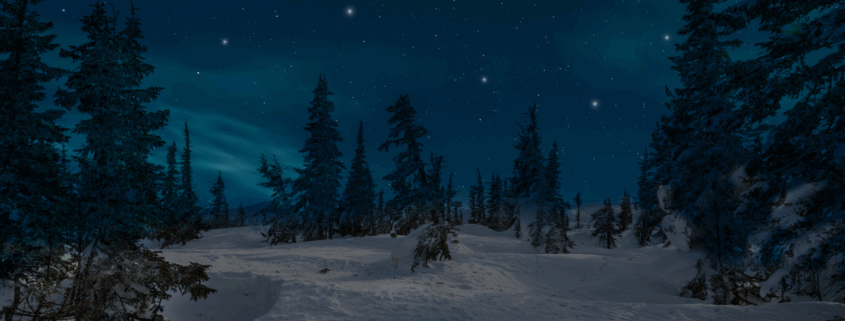 Atmosphärische Winterlandschaft mit zwölf Lichtpunkten symbolisiert wie Rauhnächte das Jahr beeinflussen